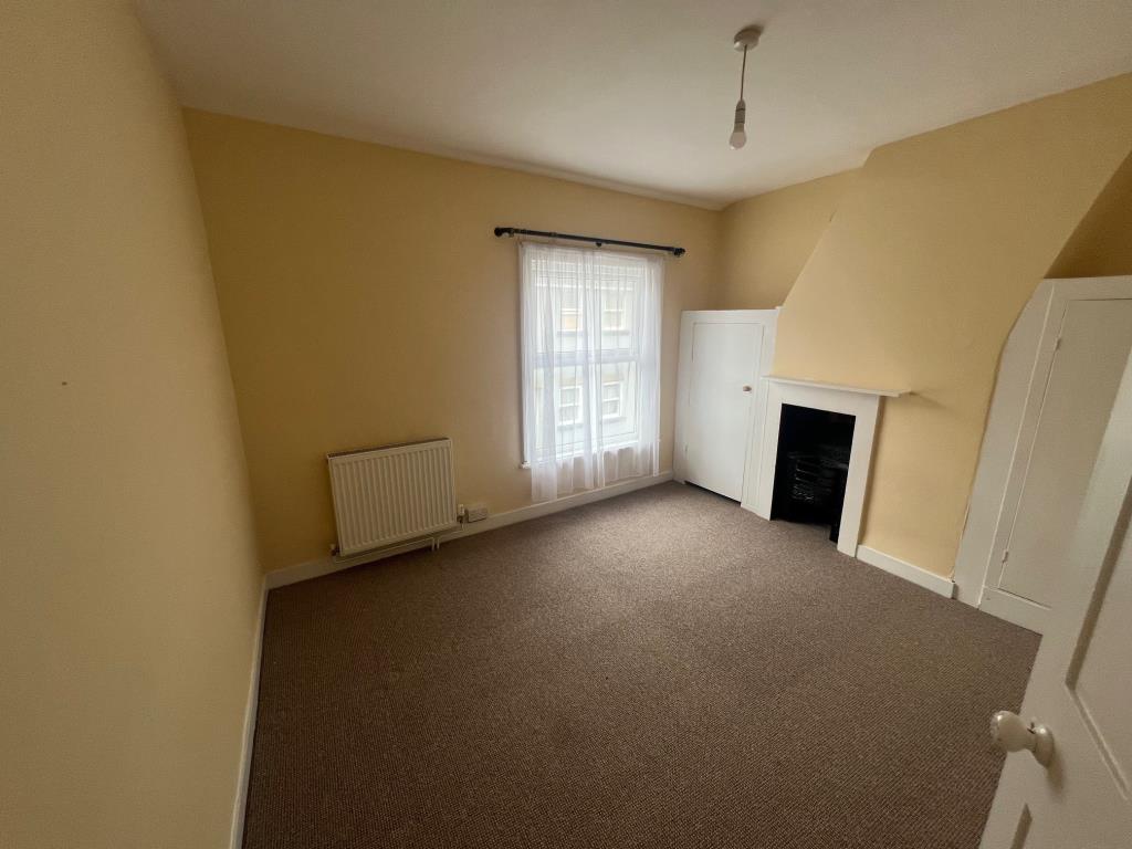 Lot: 143 - THREE-BEDROOM HOUSE IN TOWN CENTRE LOCATION - main front bedroom